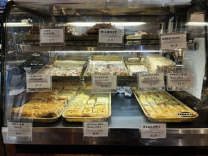 dessert / spinach pie case (chocolate halva is the only non-vegan item, today)  at Mamouns Falafel in New Haven
