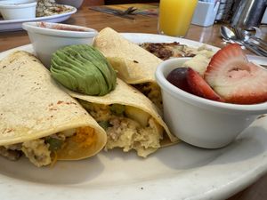 Vegan egg/meat/veggie/cheese taco with potatoes and fruit!  at Stacks in Redwood City