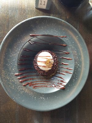 Vegan hot brownie with vanilla ice cream at Black Crust Pizzeria in Vik