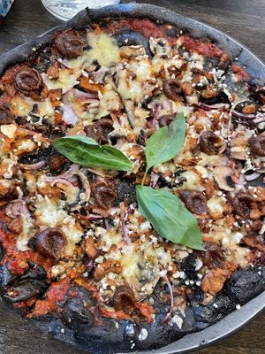 Pizza black crust  at Black Crust Pizzeria in Vik