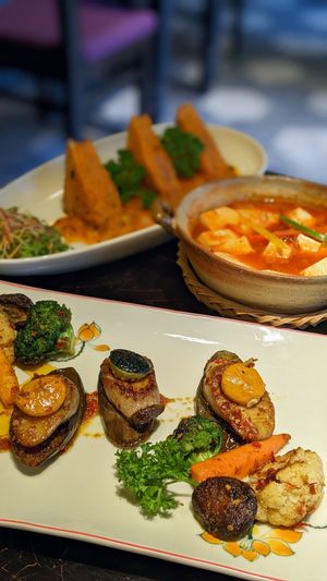 Barbecued Shimeji Mushrooms, Plum Tofu, Tomato Tofu at Shamballa Vegetarian Bistro HoiAn in Hoi An