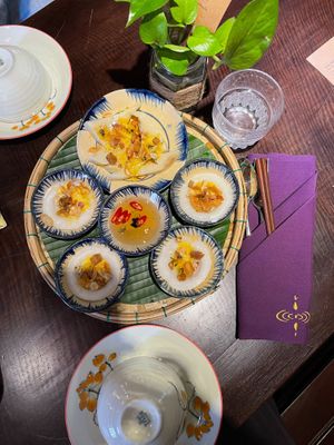 Steamed Rice Cakes
Banh Bèo - Bánh Dúc 85
Coconut-rice batter steamed & garnished with peanuts & fried onions, served w/our House sauce.
 at Shamballa Vegetarian Bistro HoiAn in Hoi An