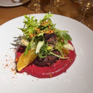Baked beet root with beet root tahini cream, orange & greens   at Cantina don Camillo in Basel
