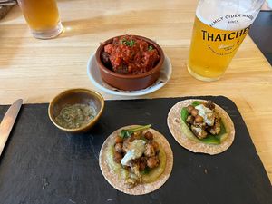 Soft shell taco’s with chickpeas and cauliflower and really nice cilantro salsa (there were three but one did not make it until the photo). And meatless balls in rich tomato sauc at House O'Hill in Newton Stewart