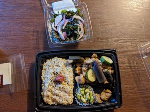 Bento box w/ soymeat, veggies and rice. And a Seaweed salad w/ red onions at Weller in Tokyo