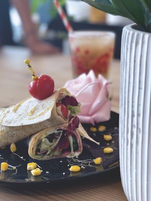 Vegan Salami Wrap + Frozen Ice Tea  at Manuto Café in Tuttlingen