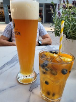 husband hiding behind his beer 😉  at Manuto Café in Tuttlingen