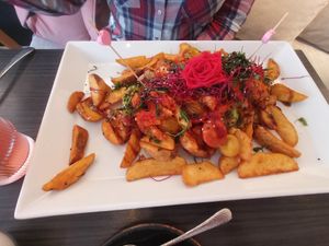 Wedges mit "Chicken" at Manuto Café in Tuttlingen