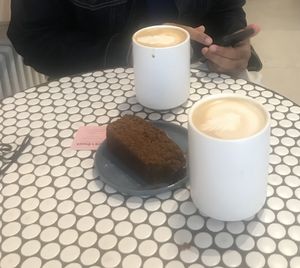 Lattes with signature almond macadamia milk and vegan molasses kabocha loaf  at Bird & Branch in New York City