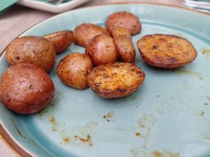 Fried potatoes with herbs at Bojtorina Vegan Kitchen in Sopron