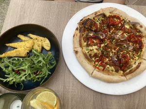 Polenta and Hungarian pizza  at Bojtorina Vegan Kitchen in Sopron