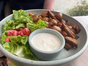 Homemade seitan gyros with spicy potatoes  at Bojtorina Vegan Kitchen in Sopron