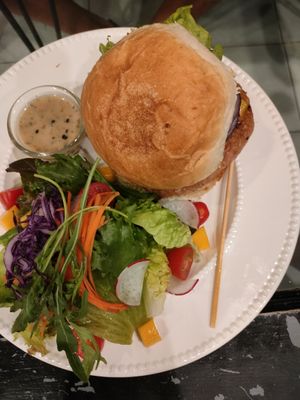 Vegan burger with coconut bun served with salad on the side #Veganuary at Heaven Burger in Chiang Rai
