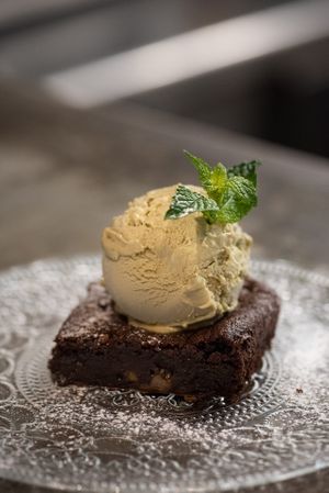 Brownie de chocolate a base de batata con helado de pistacho   at Taquería La Lupita in Madrid