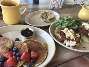Vegan pancakes and avocado toast with soyrizo and tofu and hash browns    at Snooze in Nashville
