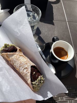 Freshly filled cannoli  at Bar Mazzini in Catania