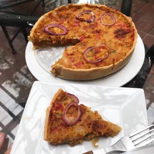 Quiche de cebollitas. / Onion quiche. at La Portentosa in Vitacura