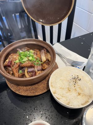 Eggplant chick’n in a clay pot with rice  at Viet Family - The Vegan House in Vancouver