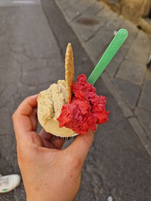 Pistachio and raspberry ice cream at Gelateria Paniko in Lucca