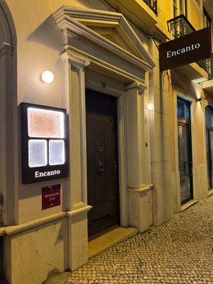 You need to ring the bell on the side to be let in... at Encanto in Lisbon