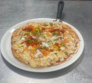 Pizza vegetal con mozzarella vegana at Es Cactus in Menorca