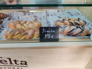 Braided pastries with cream or chocolate at La Revuelta in Granada