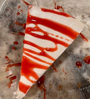 cheesecake with raspberry sauce  #Veganuary at Sipz Fusion Cafe - North Park in San Diego