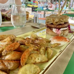 Ramen burger and chips. Bun is made of noodles  at Athens Vegan Burgers in Athens