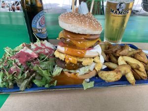 Mac & cheese burger with salad, fried potatoes & a beer  at Athens Vegan Burgers in Athens