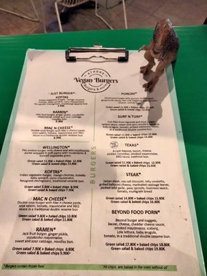 Rex and the menu at Athens Vegan Burgers in Athens