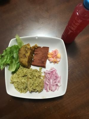 Como amazónico: Juane (bottom left) + Cecina (top middle) + Tacacho (top left) + Refresco de Camu Camu (in bottle). Also came with "aji de cocona/charapita con cebolla". at Loving Hut Lince in Lima