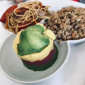 Trio criollo (arroz chaufa + causa sin veganesa + tallarin saltado) at Loving Hut Lince in Lima