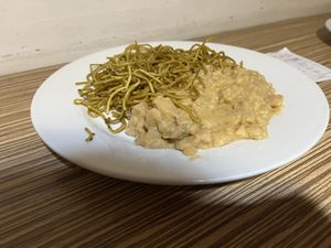 Tallarines secos con carapulcra  at Loving Hut Lince in Lima