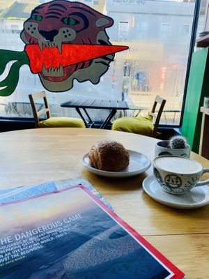 Oat flat white & vegan pain au chocolat   at Tiger Eats Carrot in Brighton