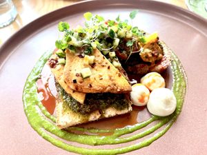 Sandwiches with amazing lightly smoked tofu, vegan feta cream, parsley pesto, tomato-pepper salsa, mushrooms and cucumber salad... one collection of flavor bombs. at Ocho in Inveraray