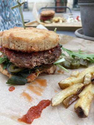 Vegan burger and bun, chips   at streat in Pecs