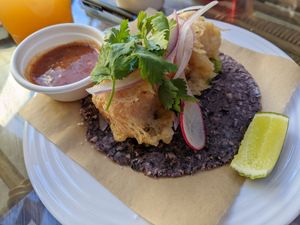 Tempura fried sweet potato taco with Salsa Roja, and hand ground heirloom blue corn tortilla at Padrón in Oakland