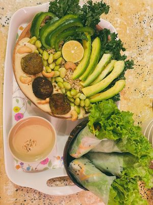 Green bowl and fresh spring rolls  at Chickpea Eatery Thuan Chay in Hoi An