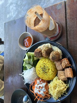 Chickpea Turmeric Rice bowl and Choco lover shake(Banana, peanut, coconut, cacao)  at Chickpea Eatery Thuan Chay in Hoi An