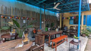 Outdoor seating area at Chickpea Eatery Thuan Chay in Hoi An