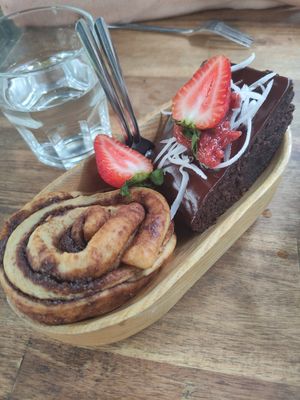Cinnamon roll and chocolate cake at Chickpea Eatery Thuan Chay in Hoi An