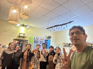 Friendly staff happy to take picture with us  at Chickpea Eatery Thuan Chay in Hoi An