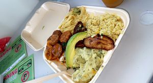 Stew chunk plate w/ plantain, rice, pasta, mashed potato & avocado   at Amore Arowako Vegan Club in St John