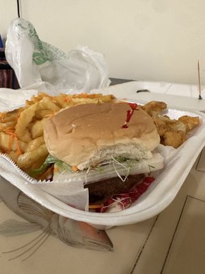 Roaryal veggie burger, fries, and cauliflower bites  at Amore Arowako Vegan Club in St John