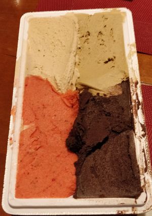 Hazelnut, pistacchio, strawberry and dark chocolate at Gelateria La Miraje in Parma