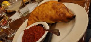 Supreme calzone. W vegan sausage & vegan cheese   at Marcello's Cucina Italiana in Sunriver
