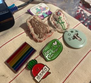 Cute badges  at Darc-en-Ciel in Seoul
