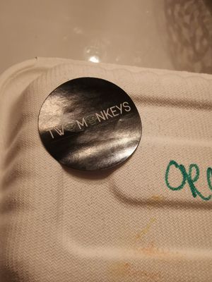 Sticker with logo at Two Monkeys in Oslo