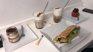 Chick'n and vegan mayo baguettes, tiramisu, chocolate cupcake and chai lattes! at Vegan Folie's in Paris