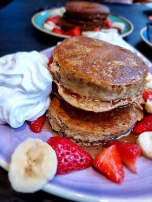 Pancakes with whip cream banana and strawberries at Pancake District in Dordrecht